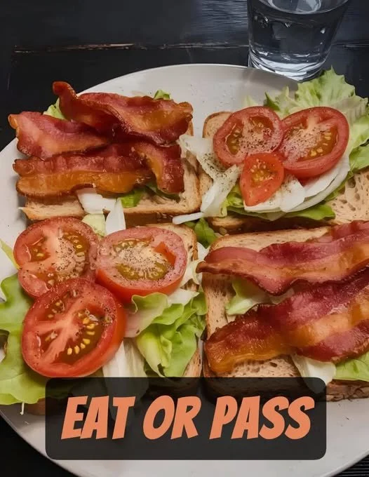 Delicious elevated classic BLT sandwich with crispy bacon, fresh lettuce, and ripe tomatoes.