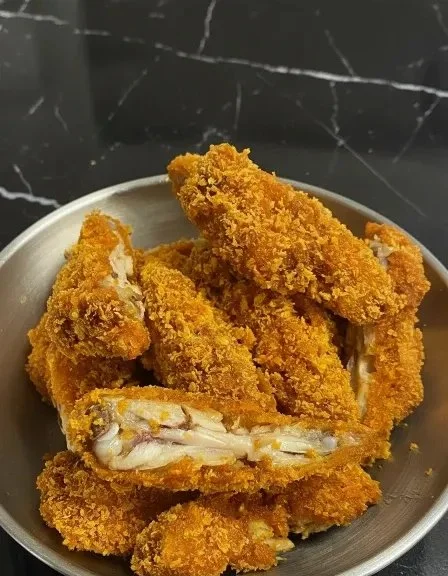 Healthy shrimp stir-fry with vegetables served in a bowl, perfect for a quick meal.