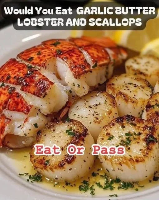 Delicious garlic butter lobster and scallops served elegantly on a plate.