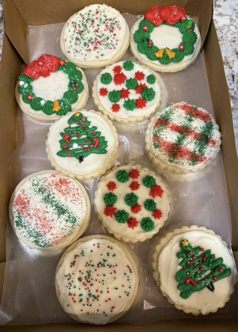 Pecan Tassies, frosted sugar cookies, dipped Gingersnaps, Christmas thumbprints, Hot Cocoa cookies.