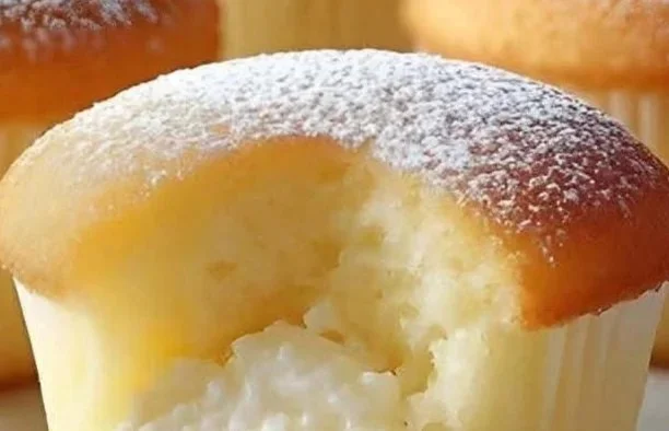 Delicious homemade cream cheese cupcakes decorated with frosting.