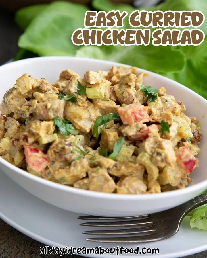 Delicious bowl of Curried Chicken Salad with colorful vegetables and spices