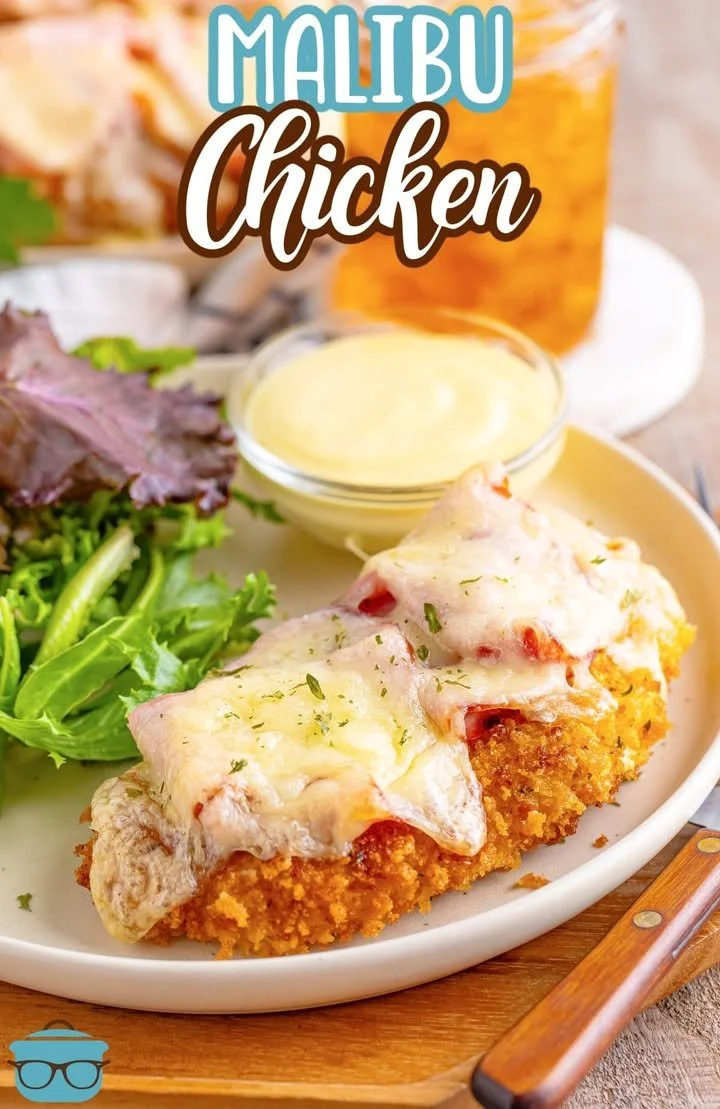 Delicious plate of Malibu Chicken with a side of vegetables