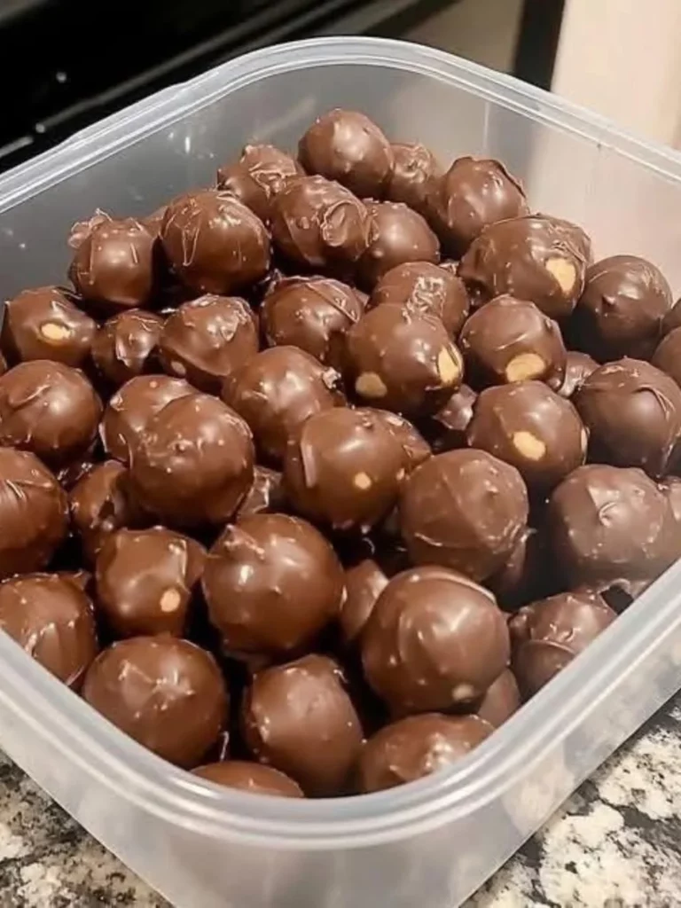 Delicious no-bake peanut butter balls ready to enjoy as a sweet treat.